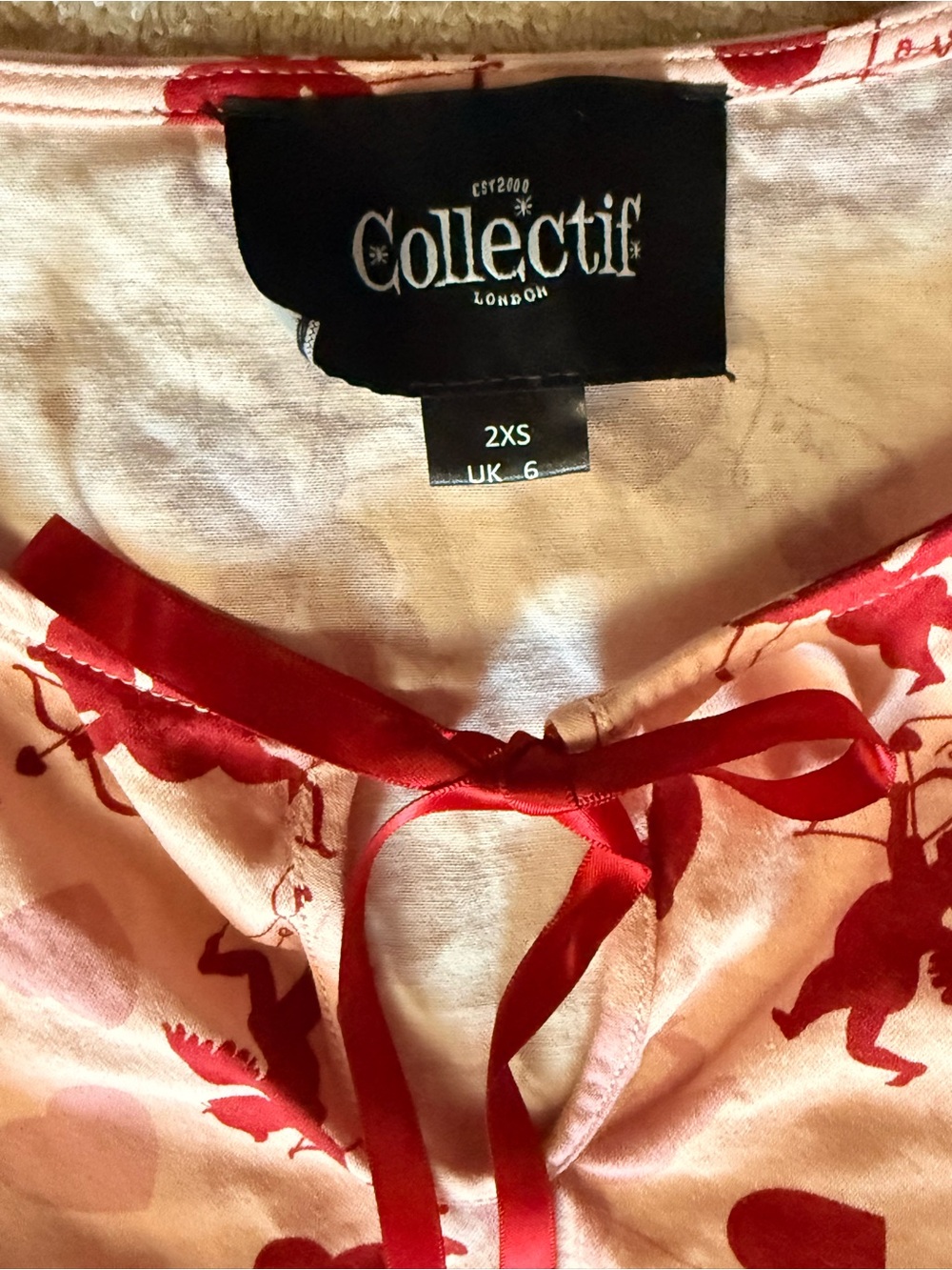 Collectif Pink Cupid Heart Peplum Blouse - Picture 2 of 3
